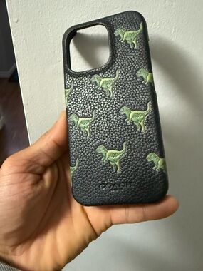 Coach Black Leather iPhone 16 (not pro) Case with Green Dinosaur Print